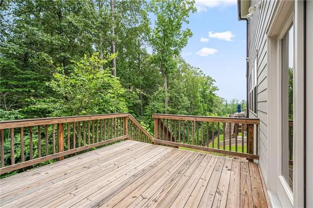 a view of balcony with wooden floor