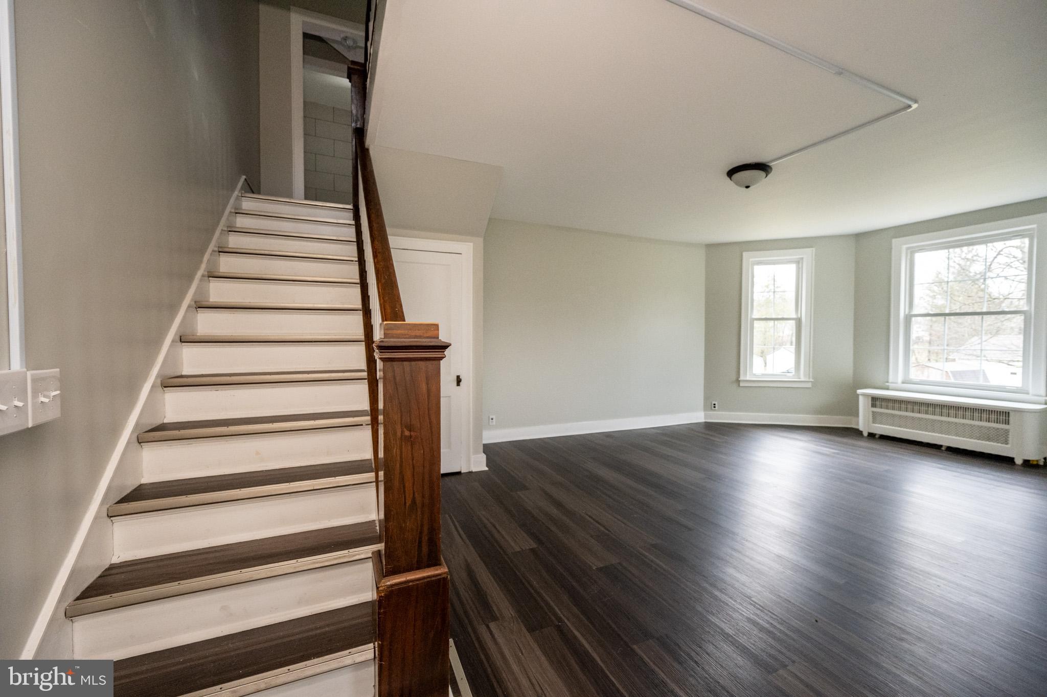 449 South 3rd Street Oakland, MD 21550 - Photo 15 of 64 Spacious entryway with elegant staircase.