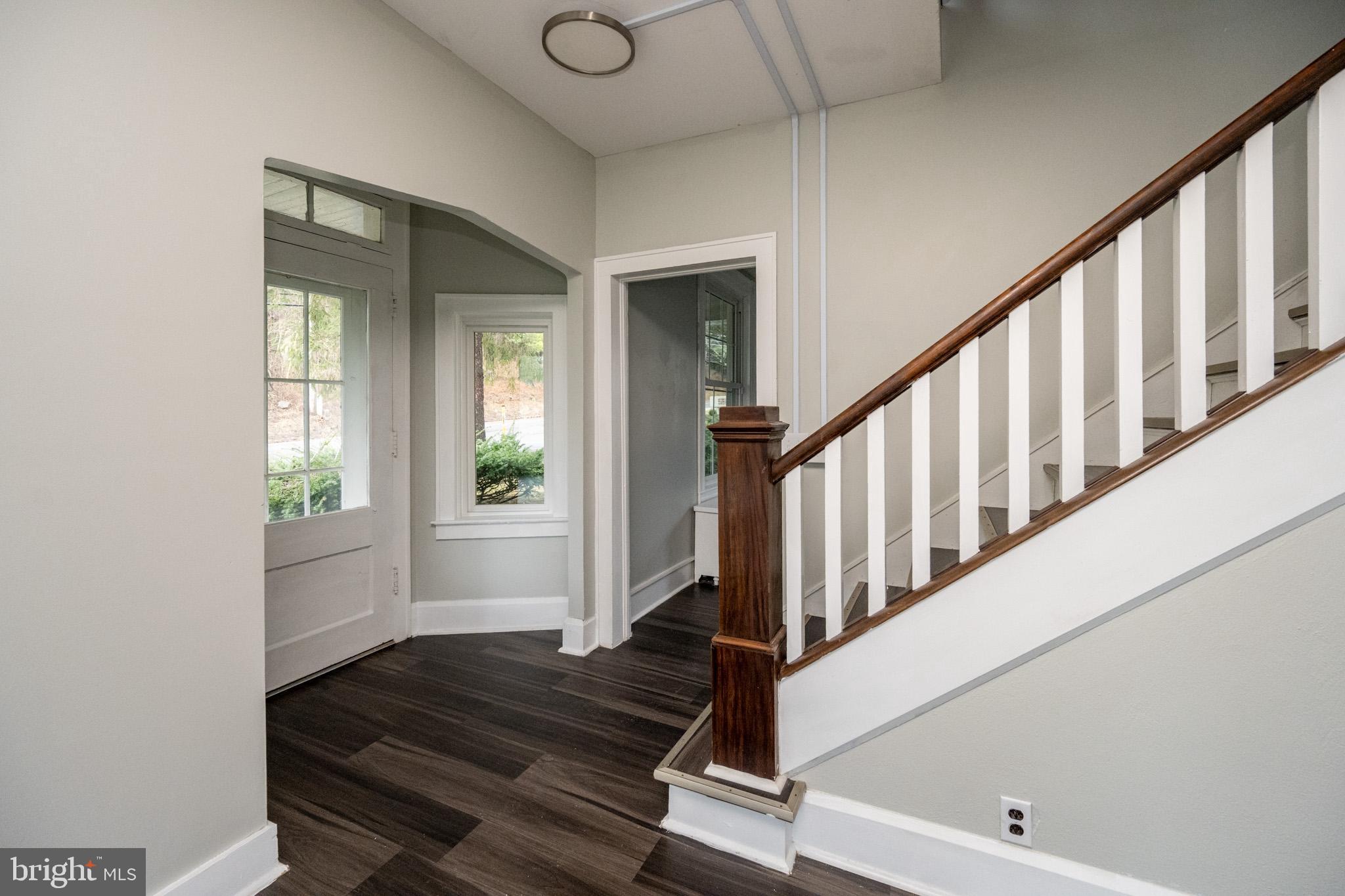 449 South 3rd Street Oakland, MD 21550 - Photo 20 of 64 Inviting entryway with elegant staircase.