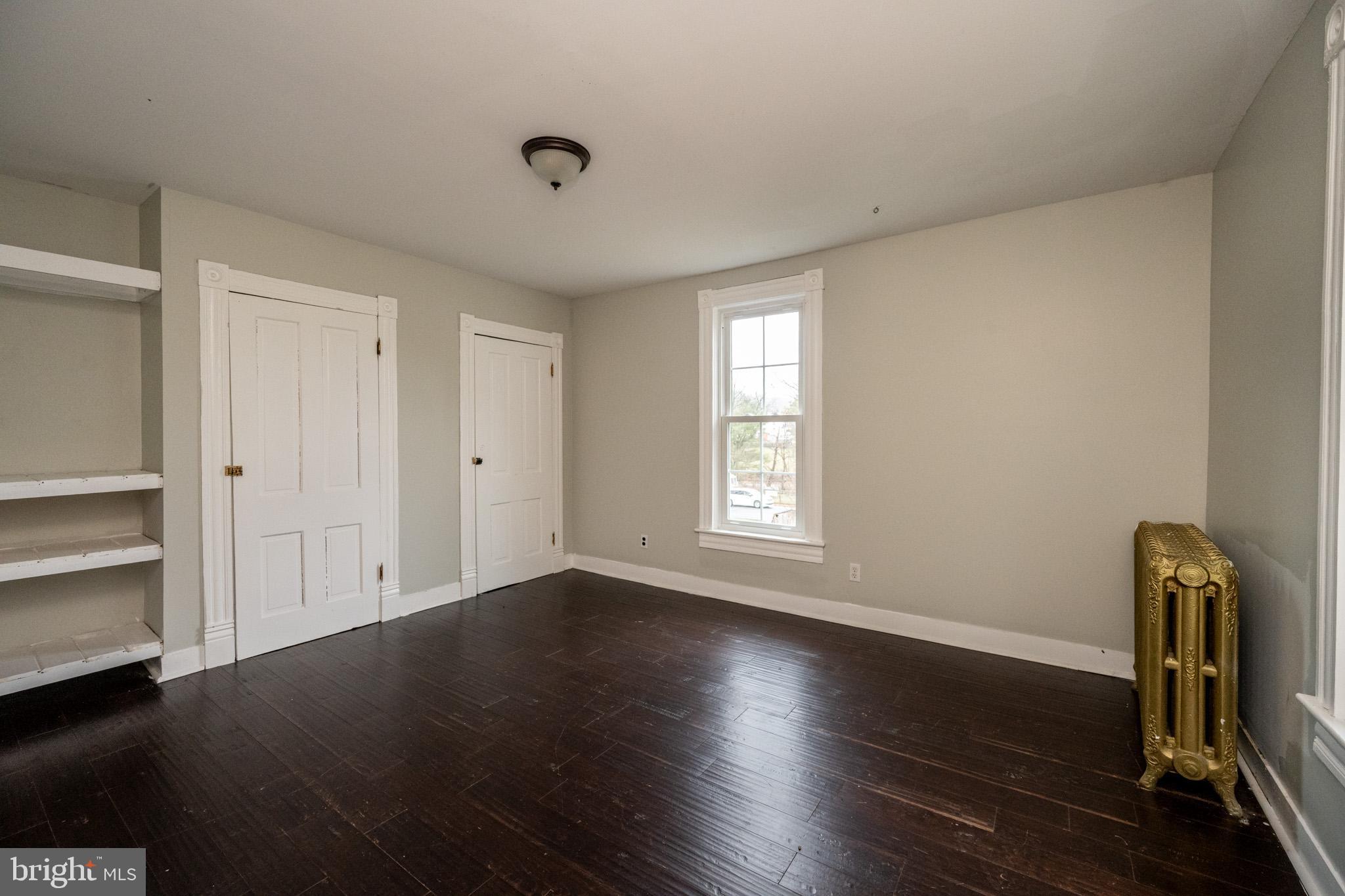 449 South 3rd Street Oakland, MD 21550 - Photo 32 of 64 Bright, airy room with classic charm.