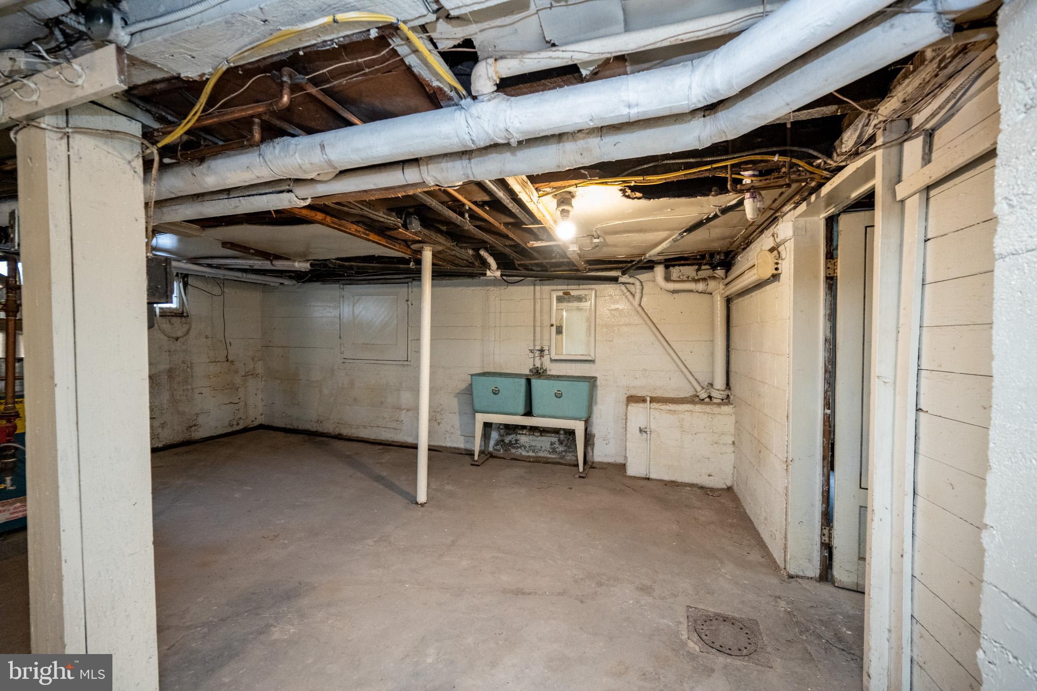 449 South 3rd Street Oakland, MD 21550 - Photo 52 of 64 Spacious basement ready for your vision.