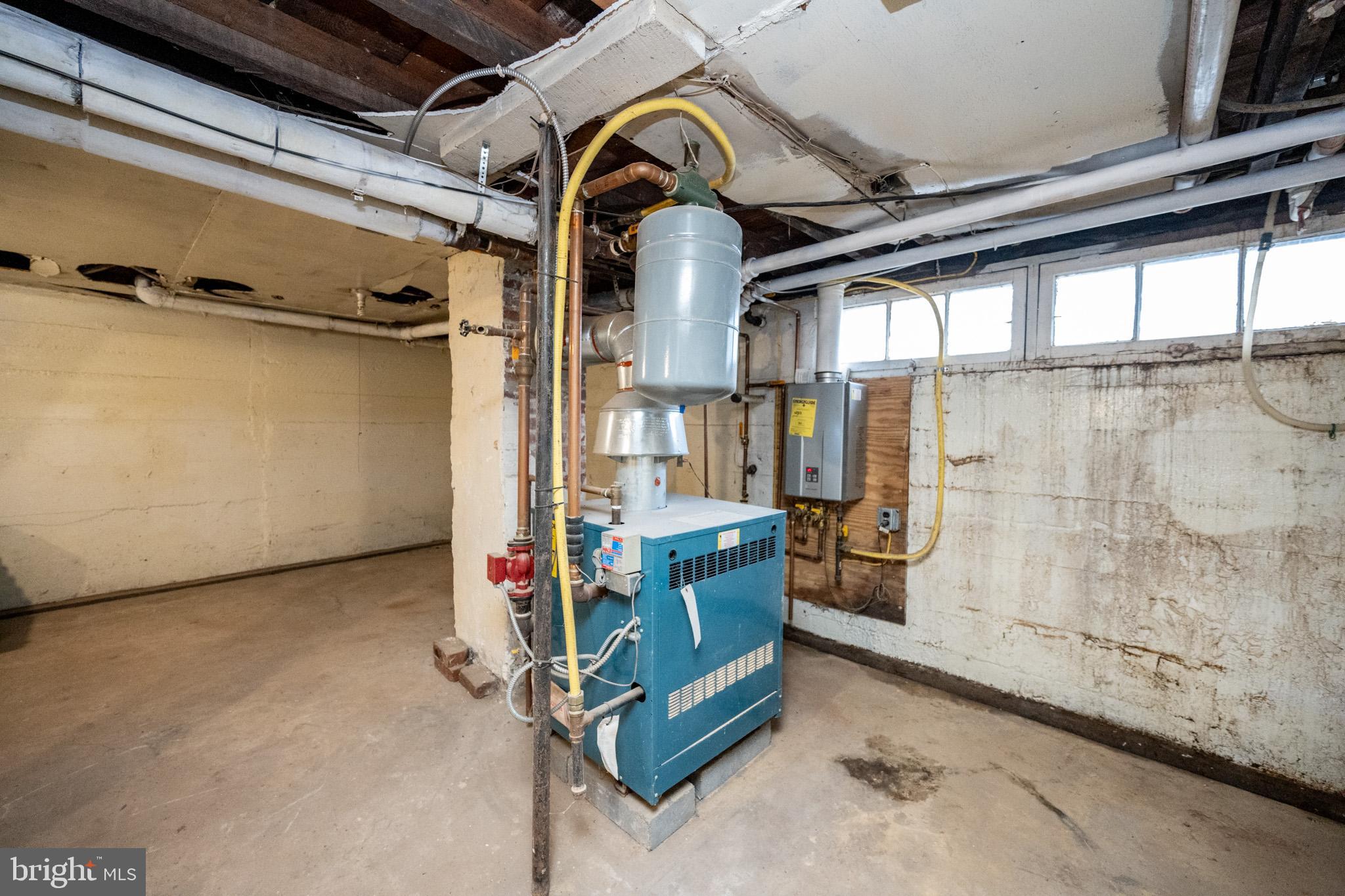 449 South 3rd Street Oakland, MD 21550 - Photo 54 of 64 Functional basement with heating system.