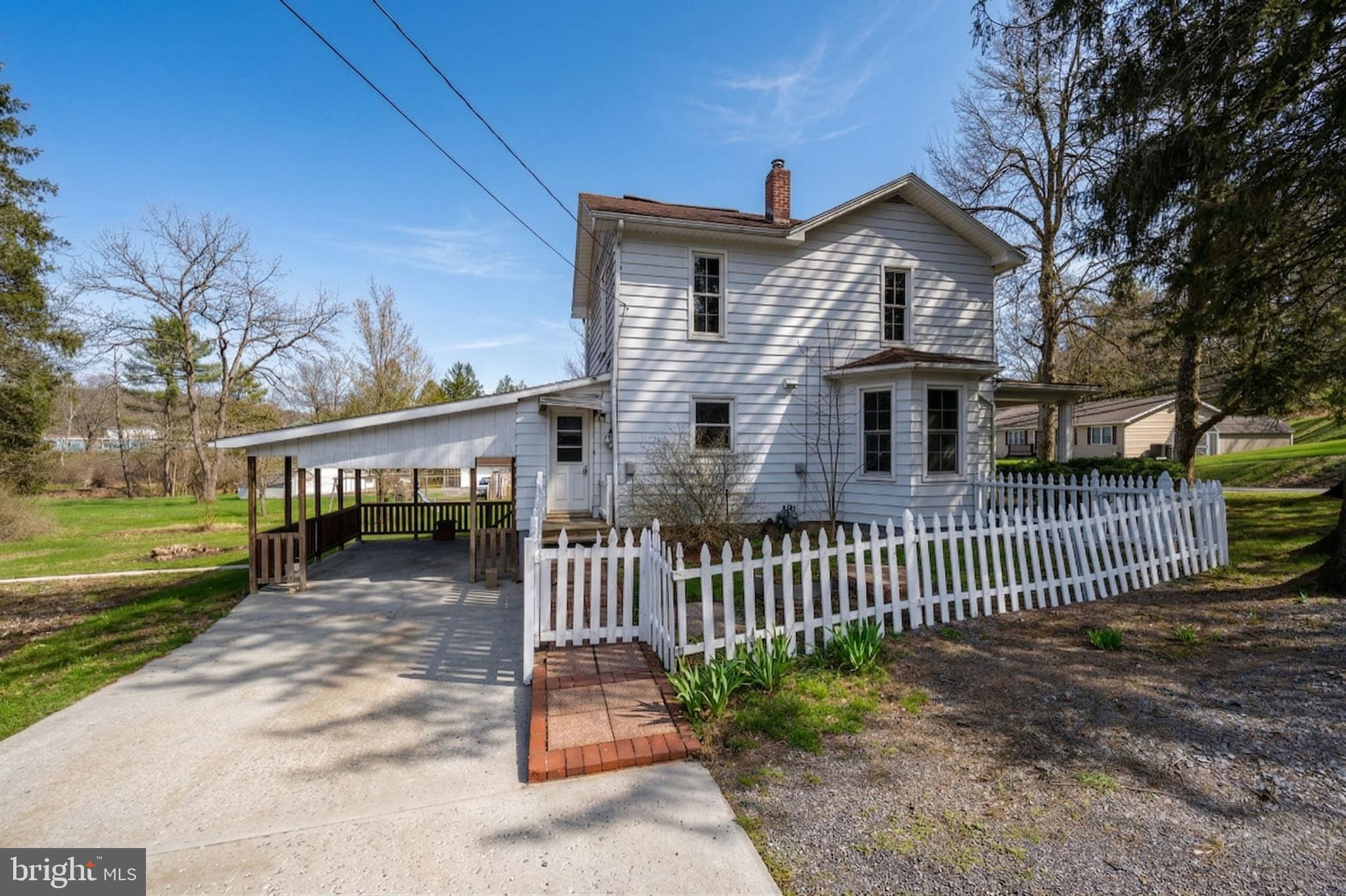 449 South 3rd Street Oakland, MD 21550 - Photo 59 of 64 a front view of a house with a yard