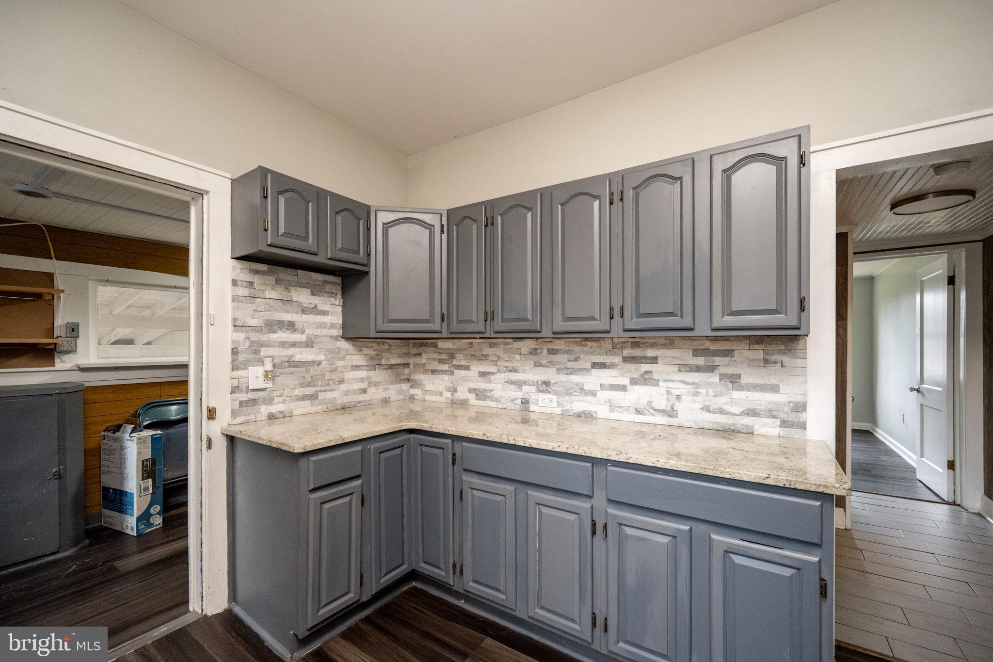 449 South 3rd Street Oakland, MD 21550 - Photo 6 of 64 Modern kitchen with stylish gray cabinetry.