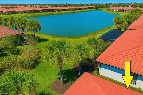 a view of a lake with a big yard