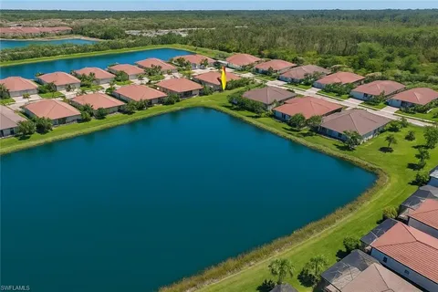 a view of a lake with a yard