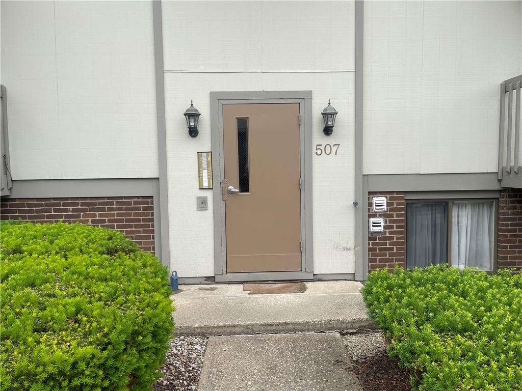 507 Hunters Path Road, Unit 12B Bridgeville, PA 15017 - Photo 1 of 25 a front view of a house with a yard