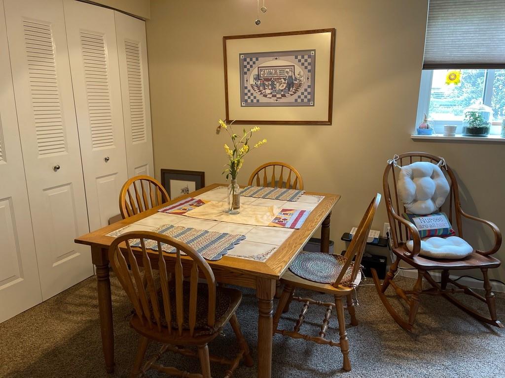 507 Hunters Path Road, Unit 12B Bridgeville, PA 15017 - Photo 13 of 25 a view of a dining room with furniture and window