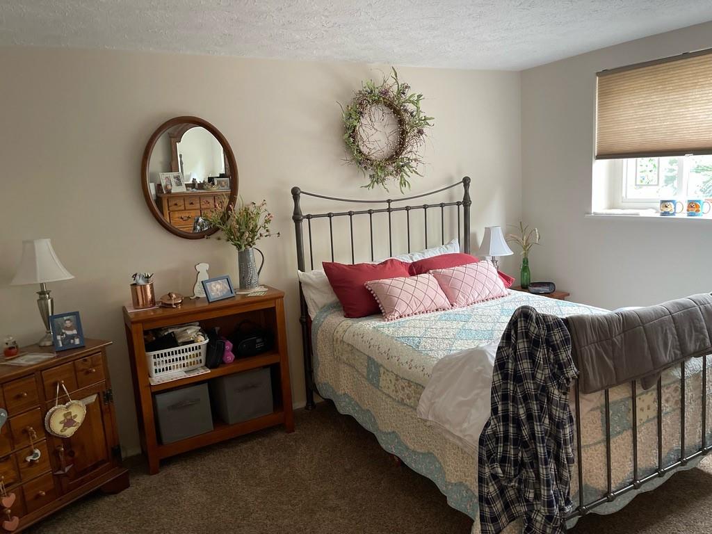 507 Hunters Path Road, Unit 12B Bridgeville, PA 15017 - Photo 18 of 25 a bedroom with bed and a window