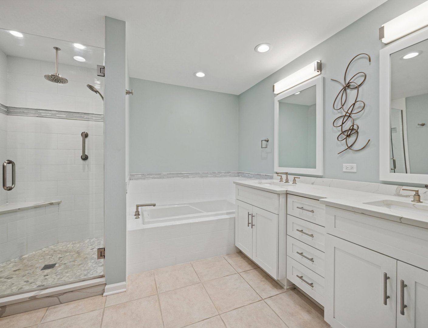 1401 Burr Oak Road, Unit 105B Hinsdale, IL 60521 - Photo 11 of 27 a bathroom with a tub sink shower and mirror