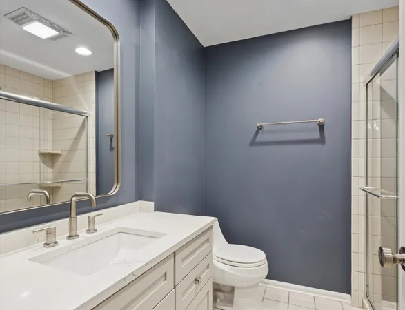 a bathroom with a sink and a toilet