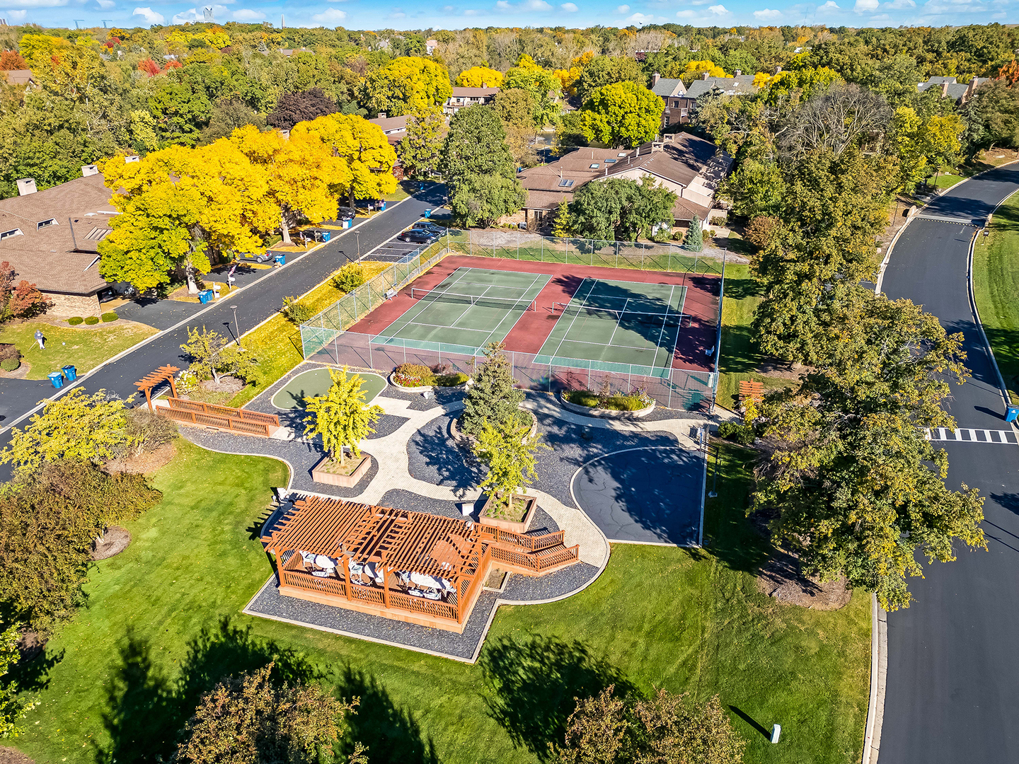 1401 Burr Oak Road, Unit 105B Hinsdale, IL 60521 - Photo 21 of 26 a sign that is sitting on a brick wall