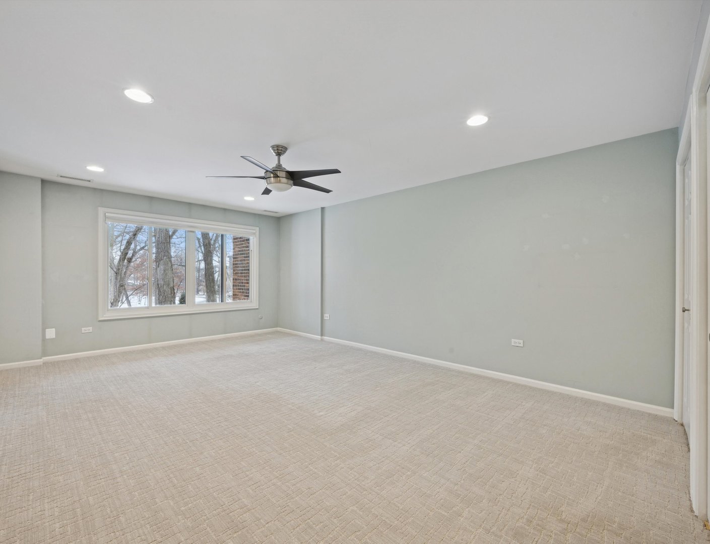 1401 Burr Oak Road, Unit 105B Hinsdale, IL 60521 - Photo 9 of 26 a view of an empty room with a window