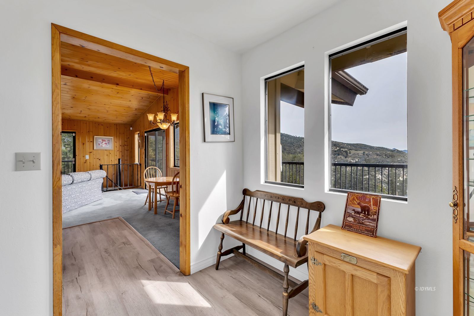 53440 West Ridge Road Idyllwild, CA 92549 - Photo 16 of 66 a view of a hallway with a livingroom with furniture