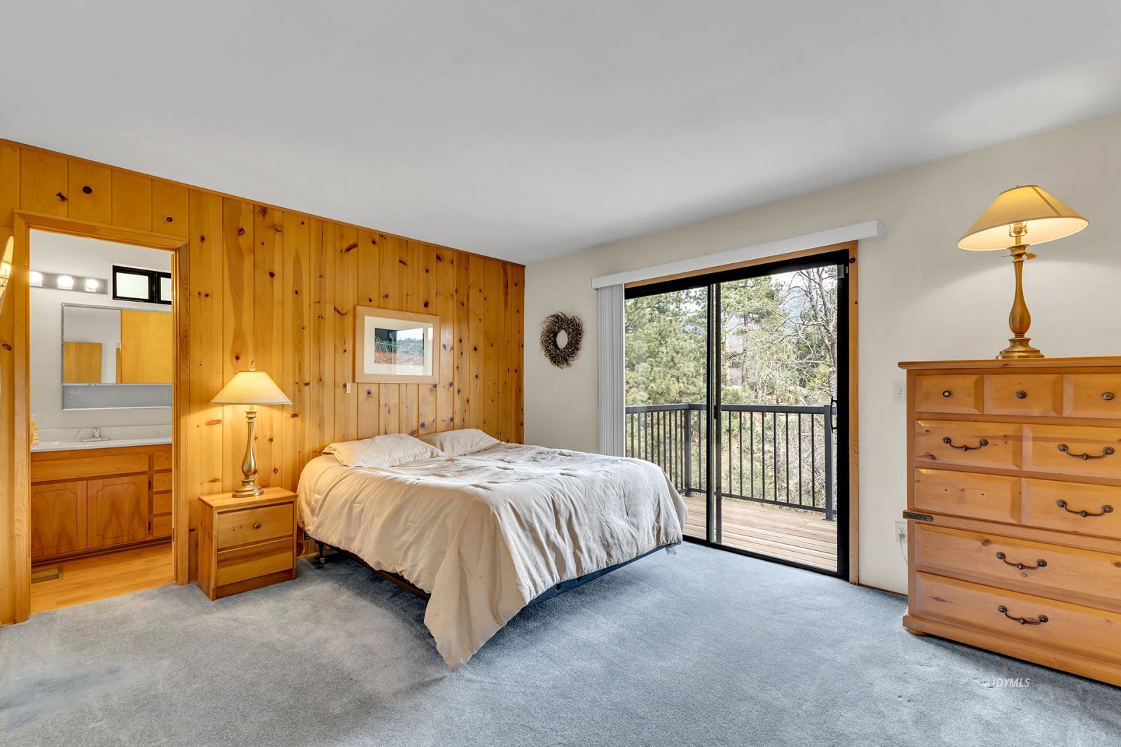 53440 West Ridge Road Idyllwild, CA 92549 - Photo 32 of 66 a bedroom with a bed and a night stand