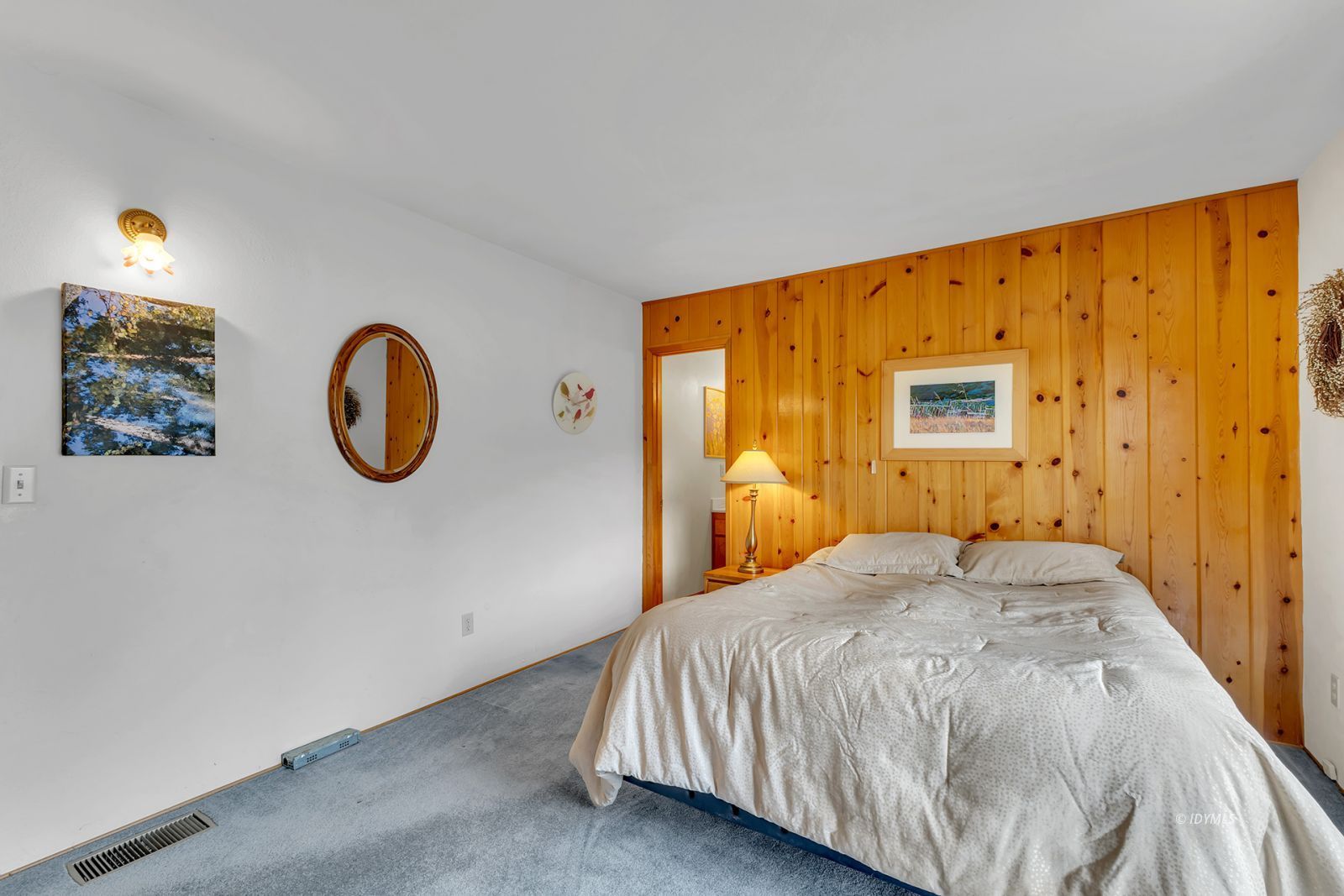 53440 West Ridge Road Idyllwild, CA 92549 - Photo 34 of 66 a bedroom with a bed and a painting on the wall