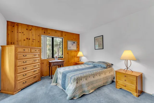 a white refrigerator freezer and a dishwasher