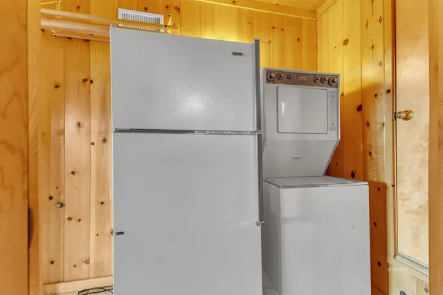 a picture of a bathroom with a shower