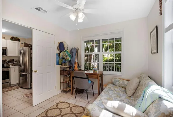 a living room with furniture and a window