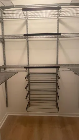 a view of a room with racks on the wall