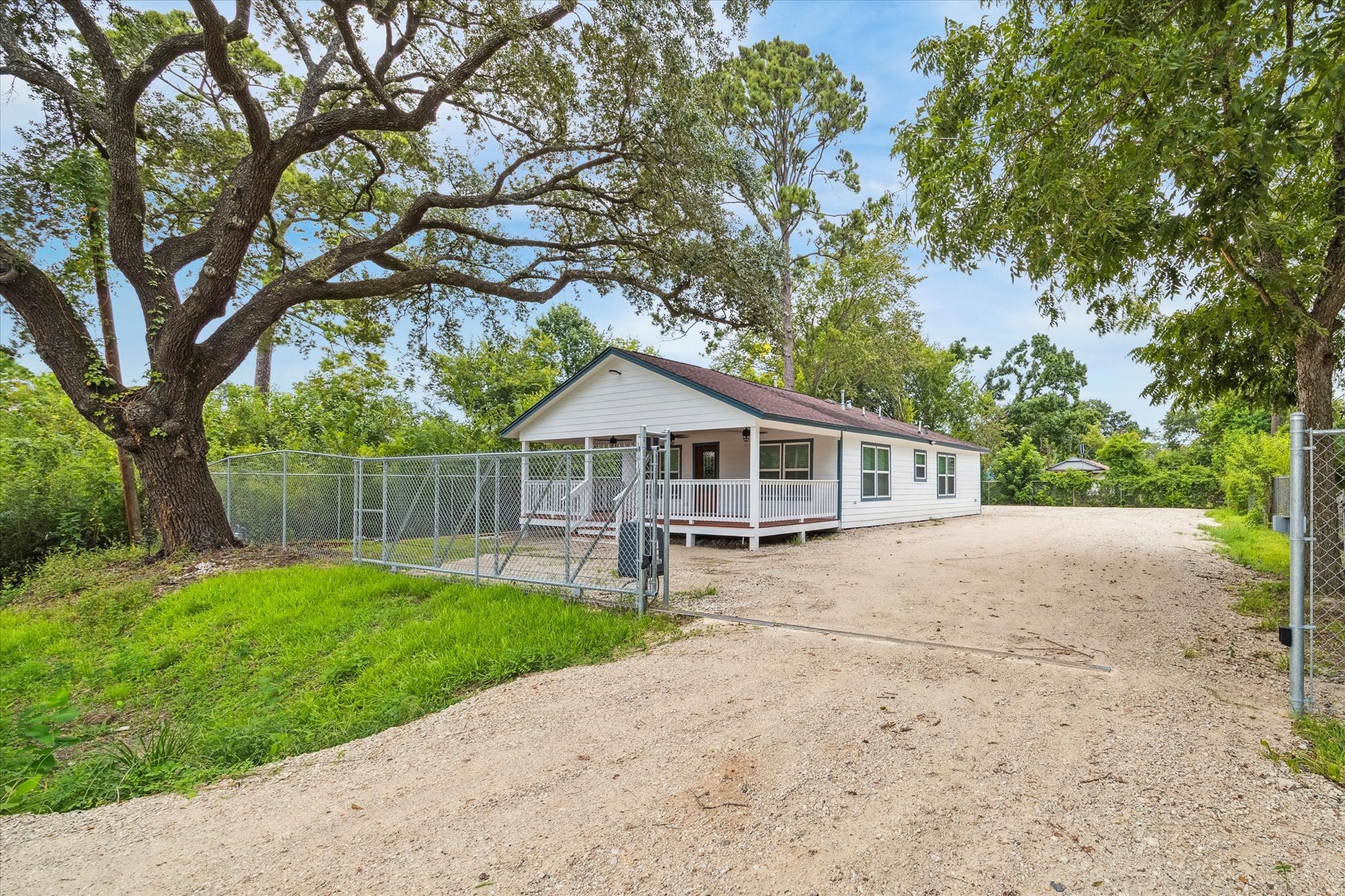 7229 Touchstone Street Houston, TX 77028 - Photo 3 of 11 a view of a house with a yard