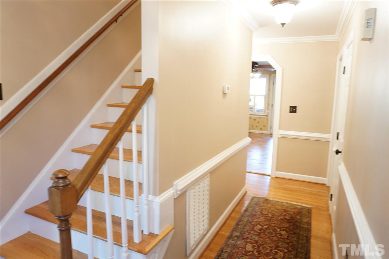 8500 Boot Court Raleigh, NC 27615 - Photo 2 of 25 Hardwoods on the stairs, crown molding, chair rail, smooth ceilings.