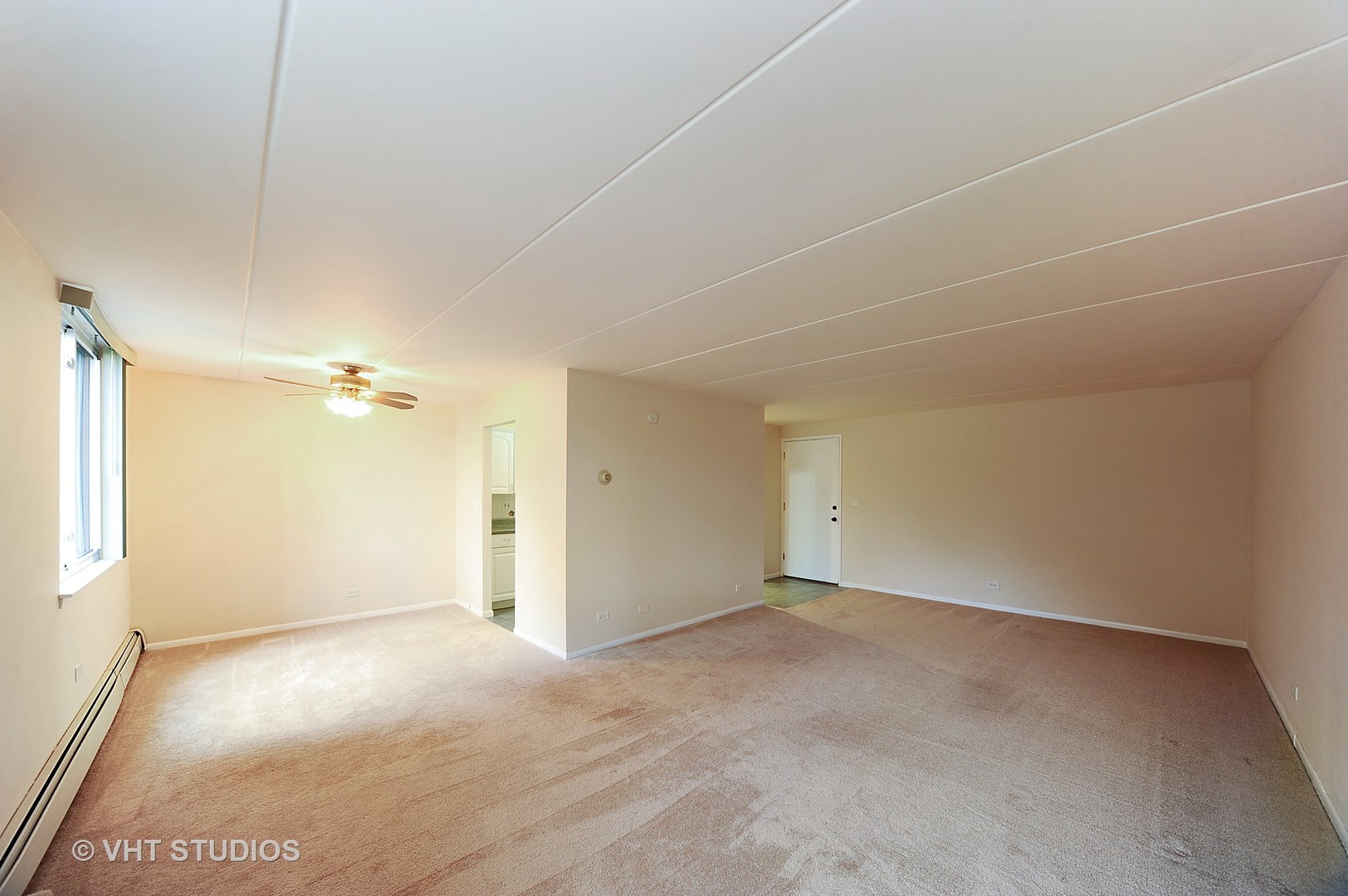 225 South Rohlwing Road, Unit 116 Palatine, IL 60074 - Photo 3 of 10 a view of an empty room