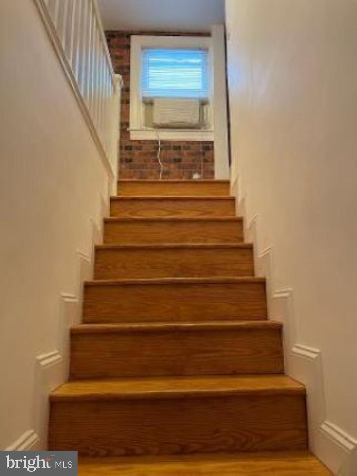 113 North Hammonds Ferry Road Linthicum Heights, MD 21090 - Photo 13 of 31 Stairs to upper level suite