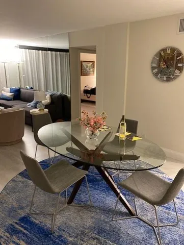 a view of a dining room with furniture