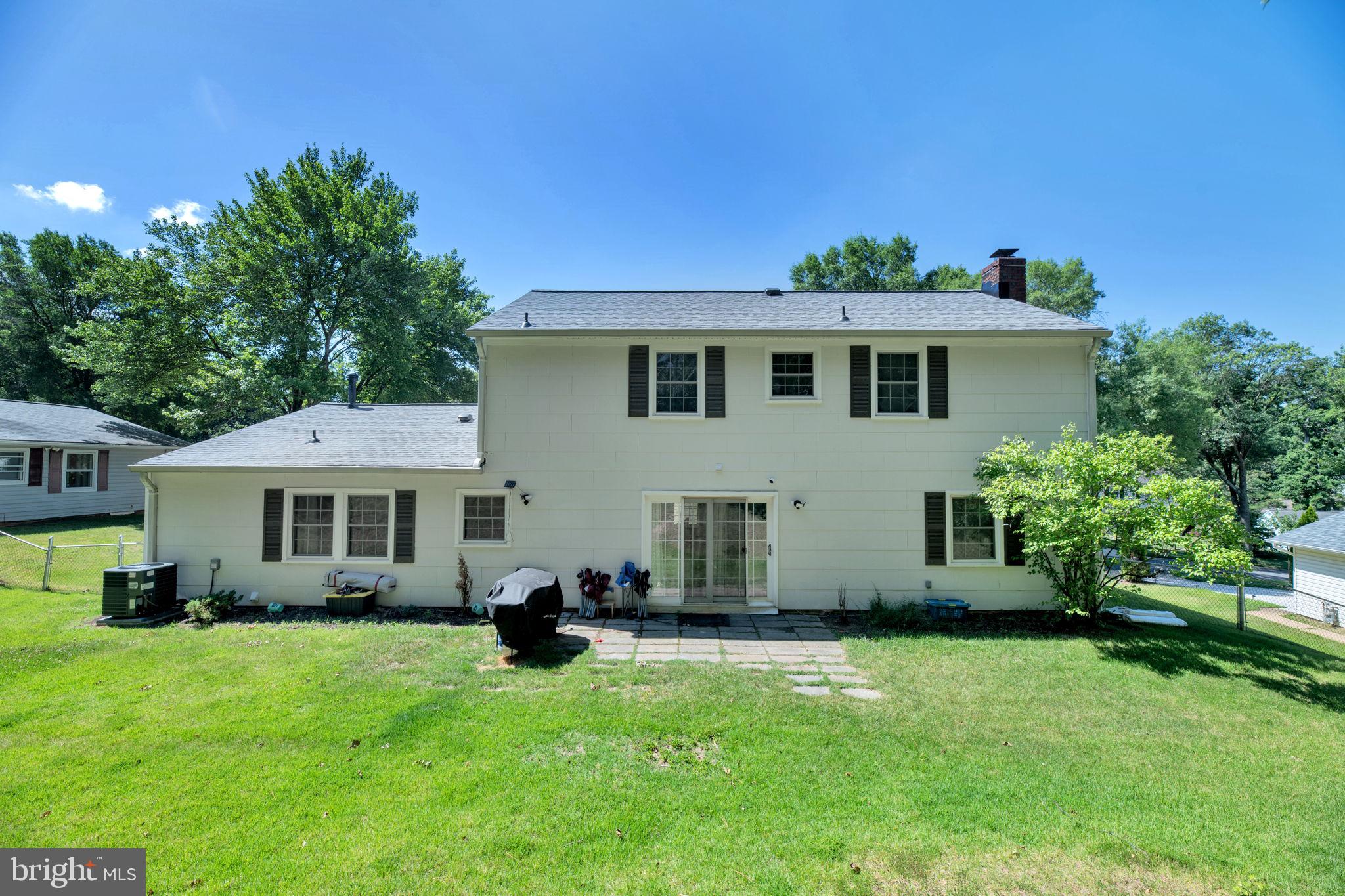 8812 Churchfield Lane Laurel, MD 20708 - Photo 26 of 31 a front view of a house with a garden