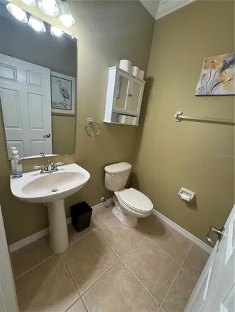 a view of storage and utility room with two washing machine