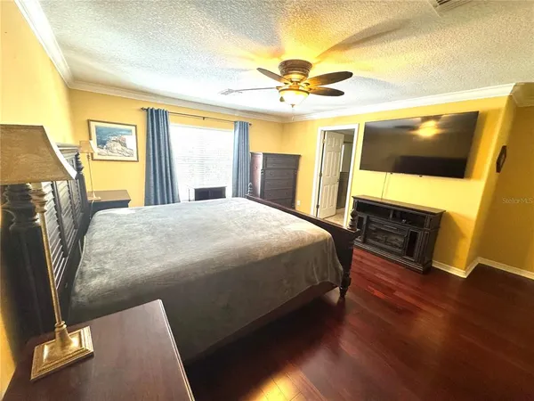 a living room with a couch and a flat screen tv