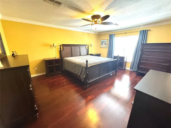 a living room with a couch and a rug