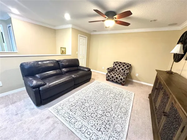 a bed room with a bed and a chandelier