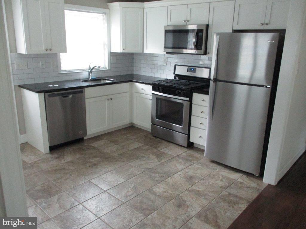 1095 Roberts Road Media, PA 19063 - Photo 3 of 40 kitchen from living room