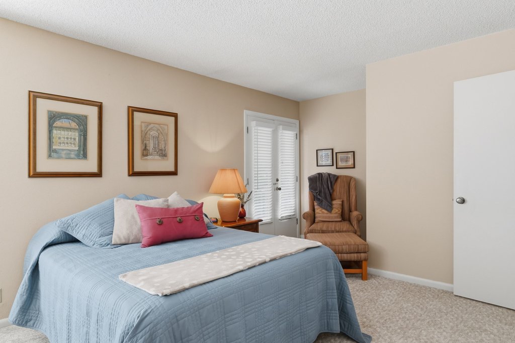 3500 Enfield Road, Unit E Austin, TX 78703 - Photo 25 of 40 Bedroom 1 opens directly to the balcony, inviting the morning breeze and soft light to start your day.