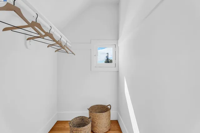 a view of a room with racks on the wall