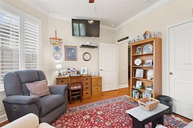 a bathroom with a granite countertop sink mirror vanity and toilet