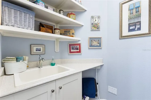 a view of a garden with sitting area