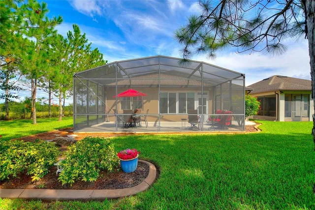 a view of a tennis ground with a large pool
