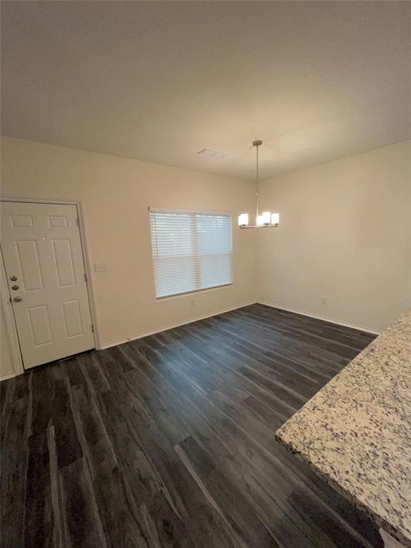 103 East 15th Street Bonham, TX 75418 - Photo 6 of 17 wooden floor in an empty room