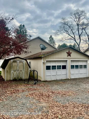 a house view with a backyard space