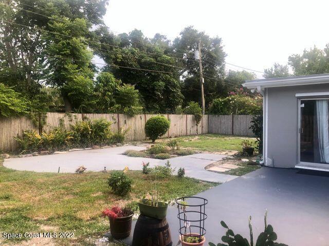 111 Highview Drive Cocoa, FL 32922 - Photo 5 of 17 a view of a backyard with swimming pool