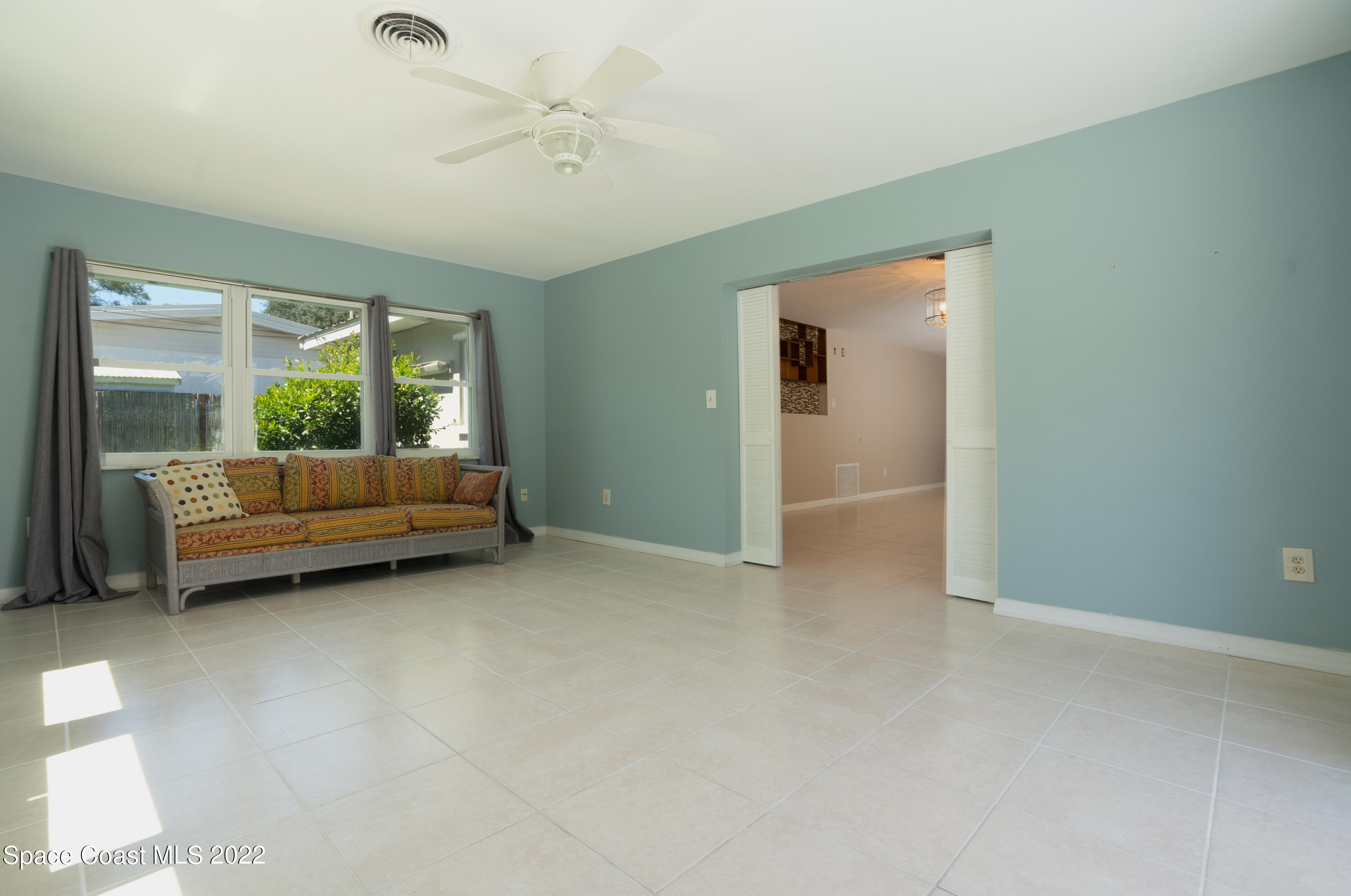 111 Highview Drive Cocoa, FL 32922 - Photo 10 of 17 a view of livingroom with furniture and windows