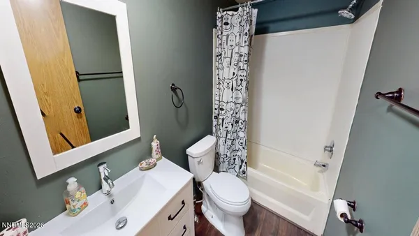 a view of a hallway with a door