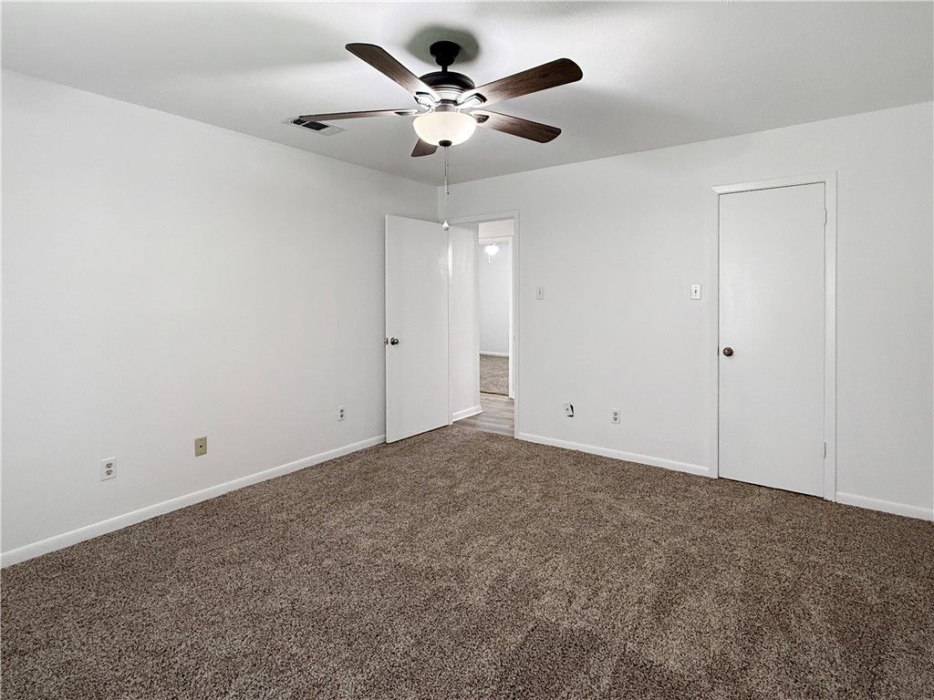 3234 Red Robin Loop Bryan, TX 77802 - Photo 11 of 19 an empty room with chandelier fan