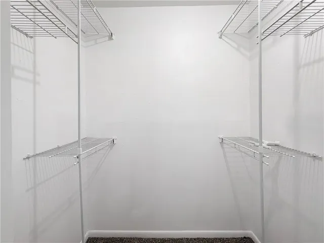 a view of small space with racks on the wall