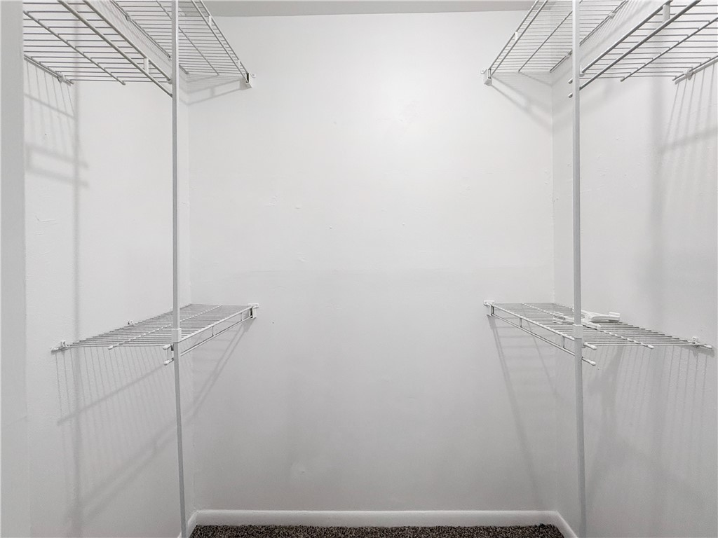 3234 Red Robin Loop Bryan, TX 77802 - Photo 12 of 19 a view of small space with racks on the wall