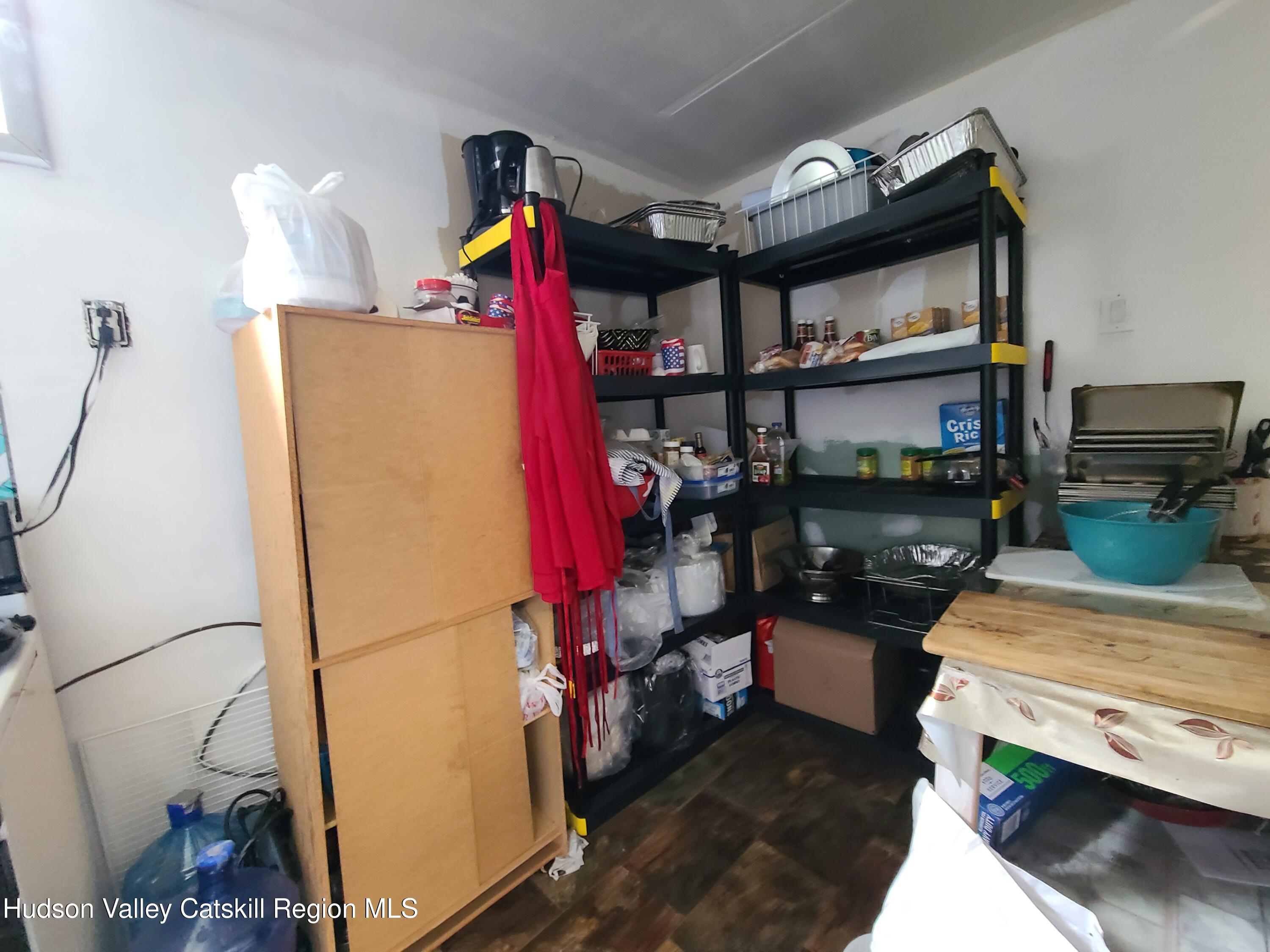 36 Cold Spring Road Monticello, NY 12701 - Photo 22 of 35 a room with storage and utility