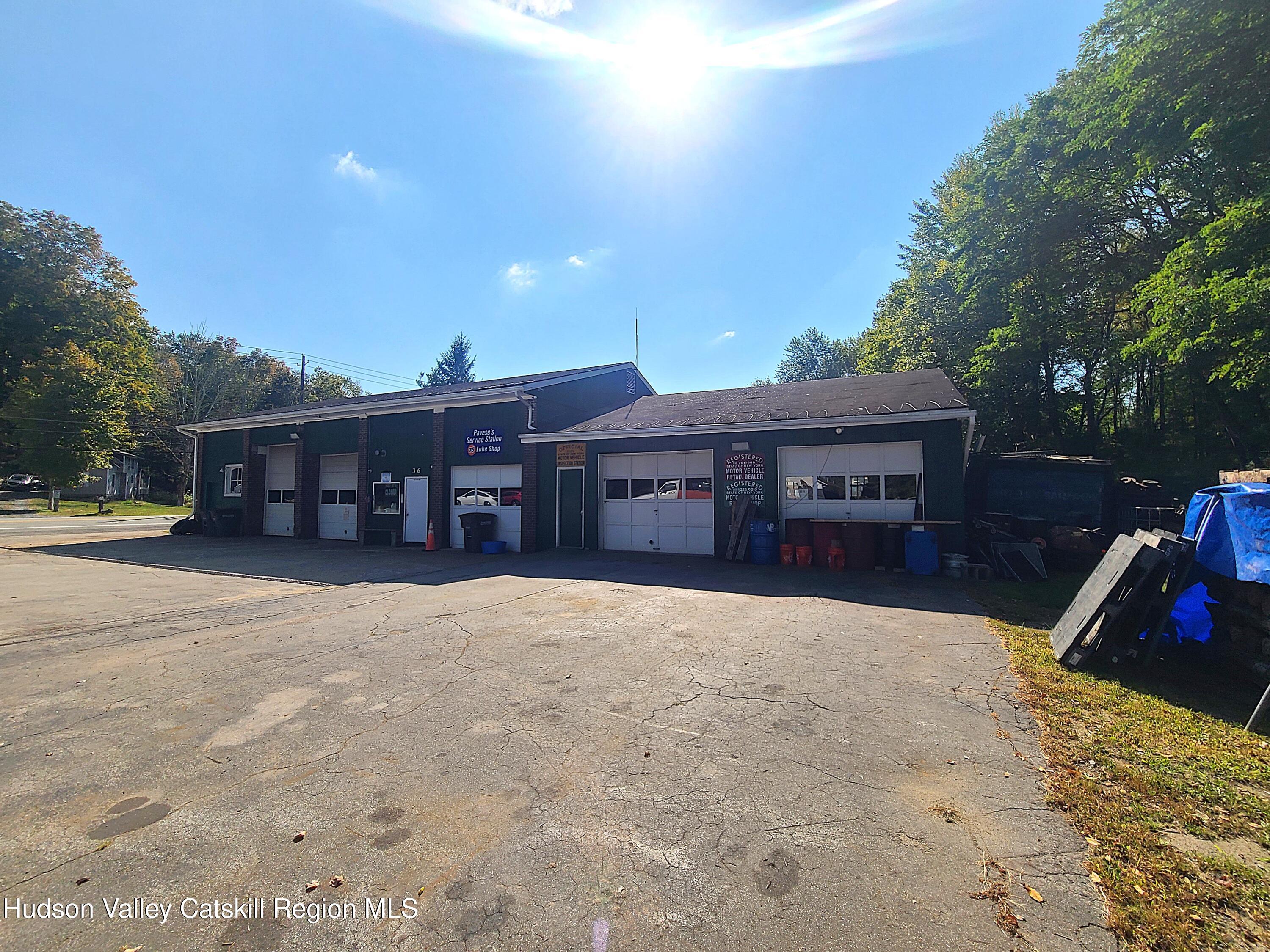36 Cold Spring Road Monticello, NY 12701 - Photo 25 of 35 a view of a house with a roof deck